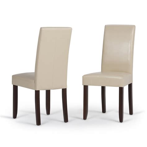 The classic parsons dining chair is a versatile seating option for your home and office. Simpli Home Acadian Satin Cream Faux Leather Parsons ...