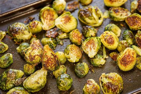Roasted brussels sprouts are the perfect side dish for so many meals. Oven Roasted Brussels Sprouts Recipe - Bowl Me Over