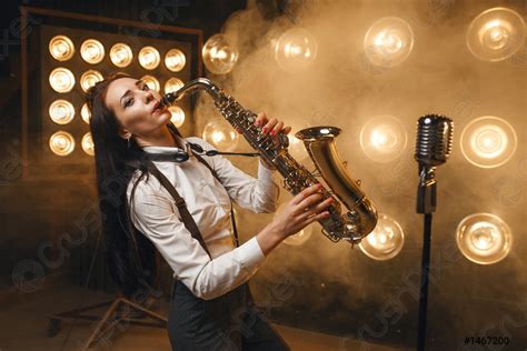 Female Saxophonist Plays The Saxophone On Stage Stock Photo 1467200