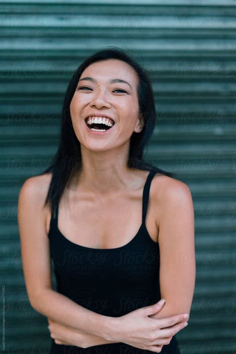 Asian Woman Smiling At Camera By Stocksy Contributor Vero Stocksy
