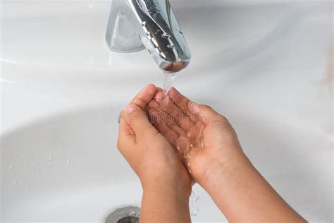 Washing Hands With Soap On A White Sink Background Male Hand Or