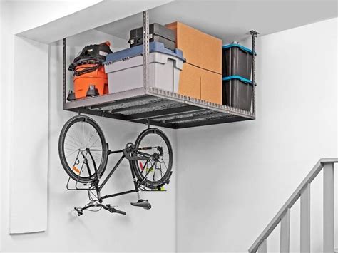Garage storage ceiling storage rack economical medium duty long span shelving warehouse storage rack. GARAGE STORAGE - Adjustable Ceiling Shelving Unit # ...