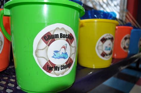 Chum Buckets For All The Chums Filled With Blue Party Favor Bags To
