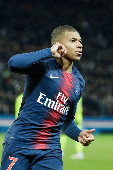 paris saint germain s french forward kylian mbappe celebrates after scoring a goal during the