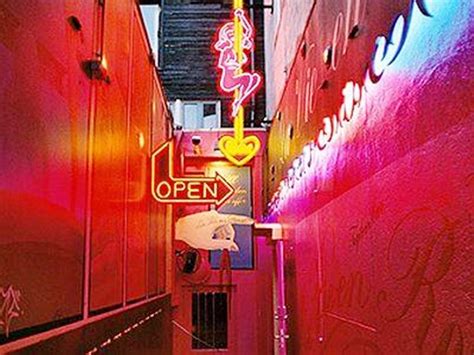 red light district in wanchai hong kong there are many nightclubs and neon is full of