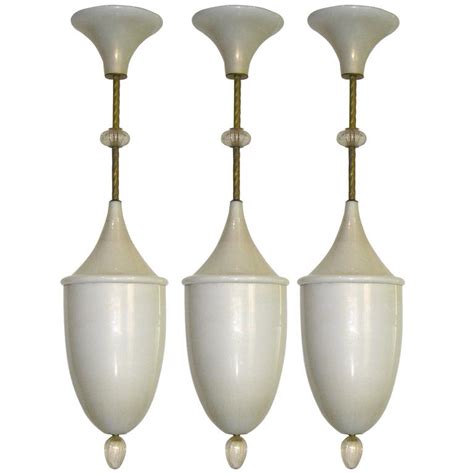 1980s Set Of Three Pendant Chandeliers In Gold And Pearl Ivory Murano
