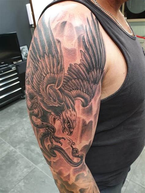16 Realistic Eagle And Snake Tattoo Designs With Meanings
