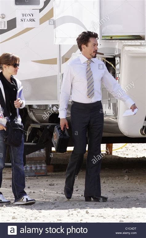 Robert Downey Jr Walking Outside His Trailer Smoking A