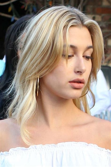 hailey baldwin straight light brown all over highlights overgrown bangs hairstyle steal her style