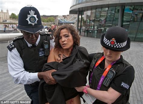 exposing islam ukrainian feminists stage topless protest near tower bridge over olympic body s