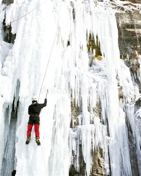 Man Climbing Frozen Waterfall Stock Image Image Of Gutsy Cold 81770749