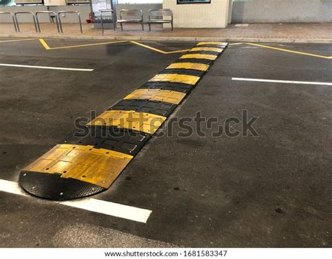 Yellow Black Speed Bump On Floor Stock Photo 1681583347 Shutterstock