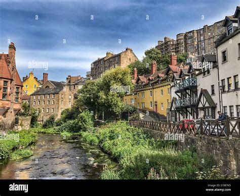 Beautiful Reflections Of Old Buildings On Water Of Leith In Dean
