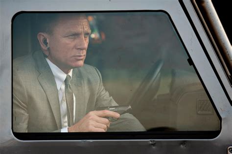 New James Bond Skyfall Images Starring Daniel Craig Naomie Harris And Javier Bardem
