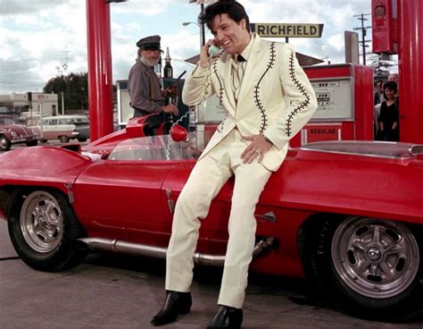 Elvis poses on a mythical norton motorcycle. Elvis Presley: The Consummate Car Collector | Premier ...