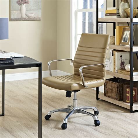 It features fixed armrests, and a. Modern Ergonomic Adjustable Swivel Faux Leather Midback ...