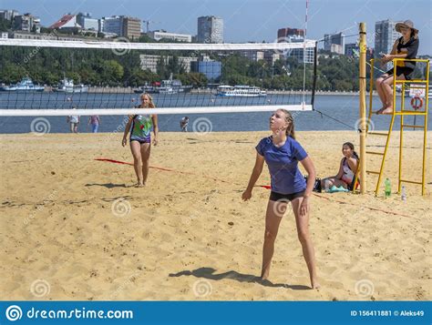 Cute Girls Play Beach Volleyball Friends Watch The Game Editorial
