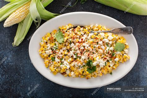 Mexican Street Corn Elote With Cotija Cheese Fresh Cilantro And Chili