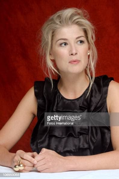 Rosamund Pike Poses For A Photo During A Portrait Session At The Park