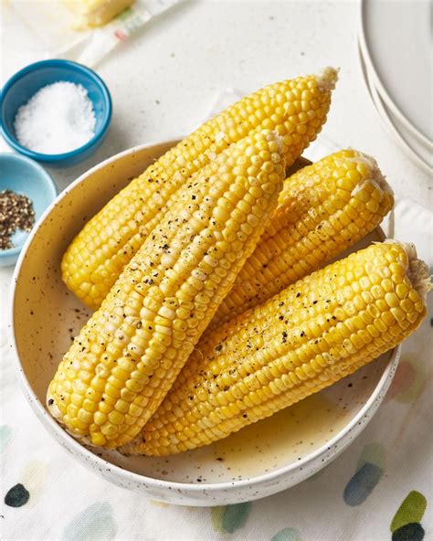 Using tongs, drop your corn into the boiling water. How To Cook Corn on the Cob | Kitchn