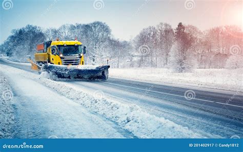 Snow Plow Truck Clearing Snowy Road After Snowstorm Stock Image Image