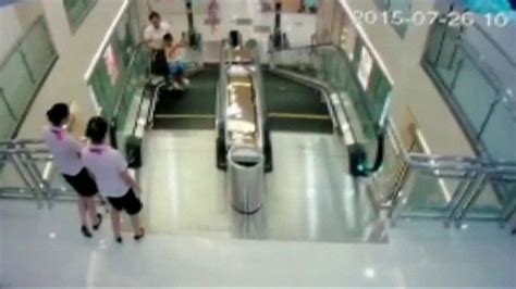 Chinese Mother Saves Son Seconds Before Falling To Death Inside