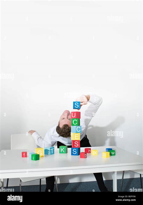 Business Man Bends Over Backwards Stock Photo Alamy
