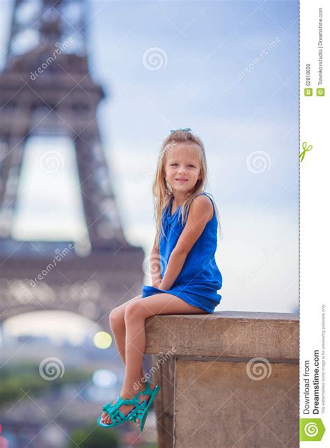 Cute Little Girl In Paris Background The Eiffel Stock