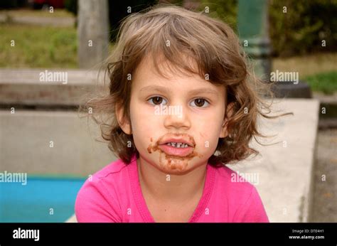 Year Old Girl Smudged From Licking Ice Cream Stock Photo Alamy