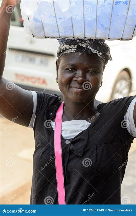 unidentified ghanaian woman carries a basket at the kumasi mark editorial stock image image of