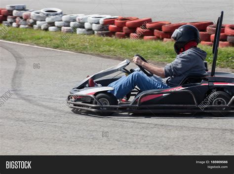 Man Drive Go Kart On Track Side View Outdoor Shot Stock Photo And Stock