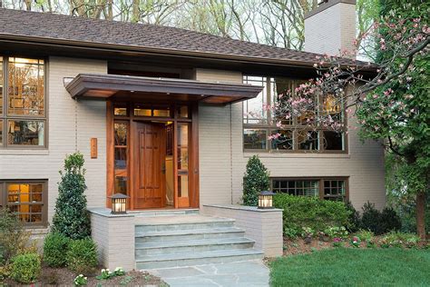 A Homely Split Level Gets A Serious Facelift While The Owner Puts His