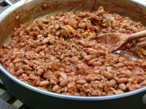 I know this may sound strange but i couldn't stop as i was beginning to make my pot of beans, i recalled my mom used to make pinto beans with smoky kielbasa sausage. pinto beans ground beef and rice