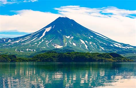 Premium Photo The Picturesque Summer Reflection Of Ilyinsky Volcano