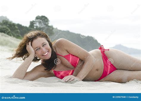 Woman Sunbathing On Beach Stock Photo Image Of Outdoors