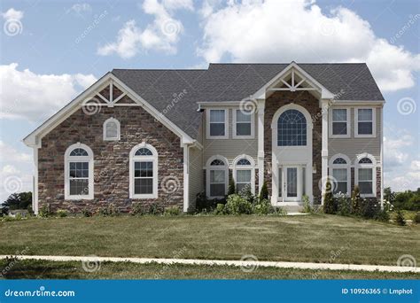 Suburban Home With Arch And Stone Garage Stock Image Image Of Home