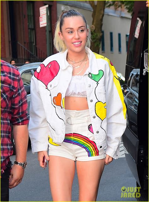 photo miley cyrus shows off her legs in rainbow shorts04 photo 3914639 just jared