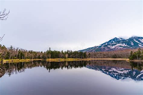 Beautiful Lake Reflecting Blue Sky Like A Mirror Rolling Mountain