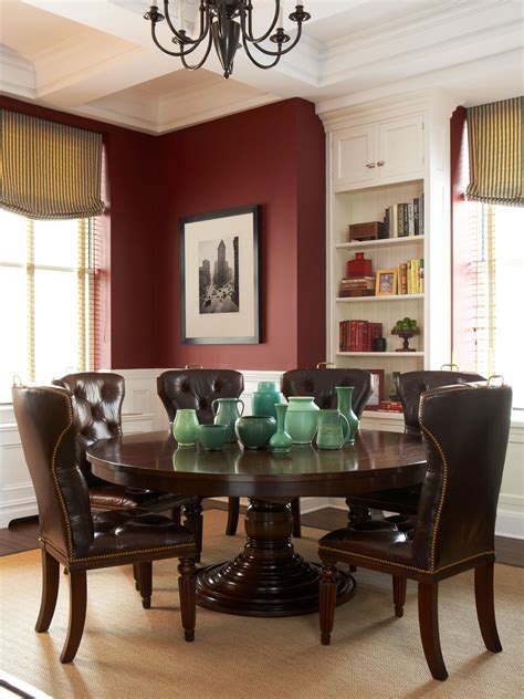 Transitional Dining Area With Burgundy Walls White Painted Wood Work