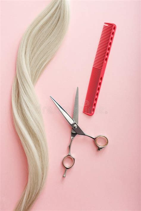 Flat Lay Composition With Hairdresser Tools Scissors Combs And Strand