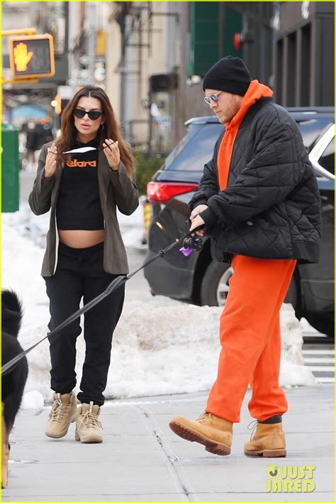 Emily Ratajkowski Shows Off Bare Baby Bump While Out With Hubby