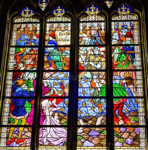 Joan Of Arc Scene On Colorful Stained Glass Window Inside The Cathedral