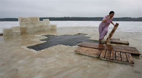 Russians Strengthen Their Faith And A Tradition With An Icy Water