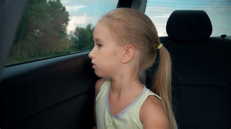 Little Girl Bored In Car Looking Out Window Stock Footage Sbv 325891095