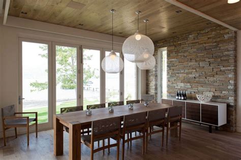 I have a 9 foot by 3.5 foot table in a dining room that has the open concept, i have not found a chandelier that i love, so i am thinking of going with 3 17 inch pendant lights spaced over the table. Beautiful pendant lights above the dining table - Decoist