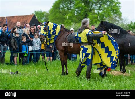 Chalfont Uk 8 May 2023 A Re Enactor As An Armoured Knight Unsaddling
