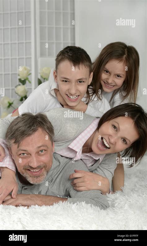 Happy Parents With Kids Stock Photo Alamy
