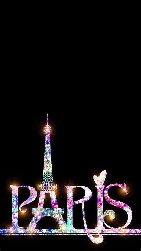 The Eiffel Tower Is Lit Up At Night With Lights In The Shape Of Paris