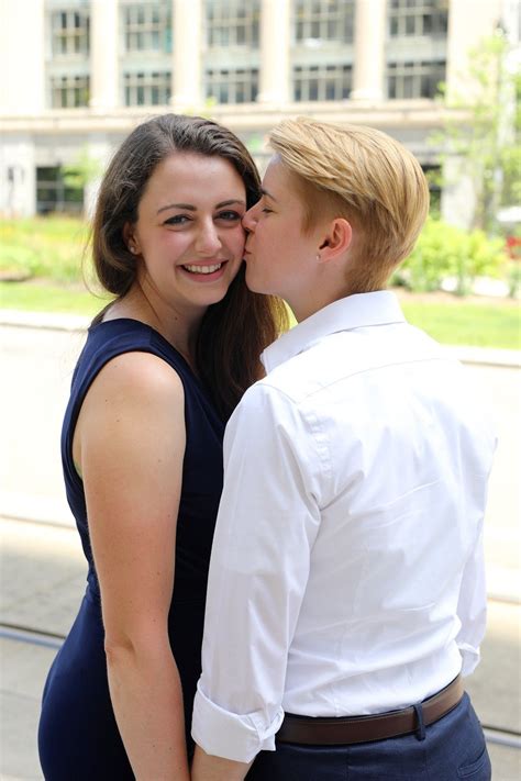 colorful engagement photos in the belt in detroit michigan two brides lgbtq downtown graffiti