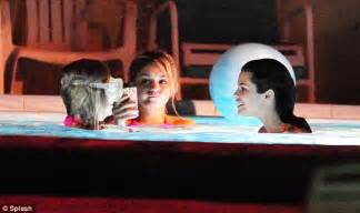 selena vanessa and ashley party in the pool during a late night dip on the set of spring